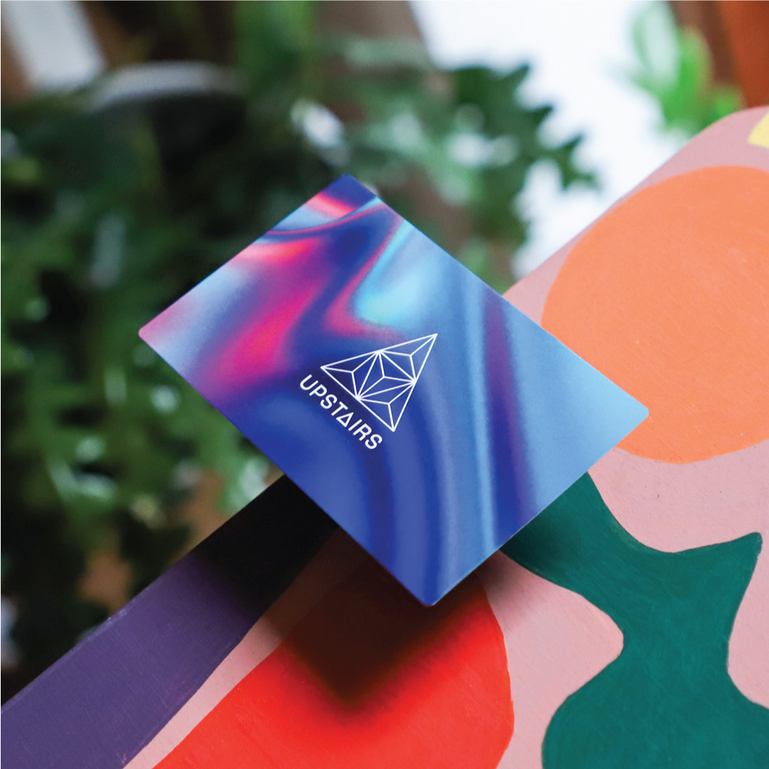 Photo of glossy multi-coloured business card