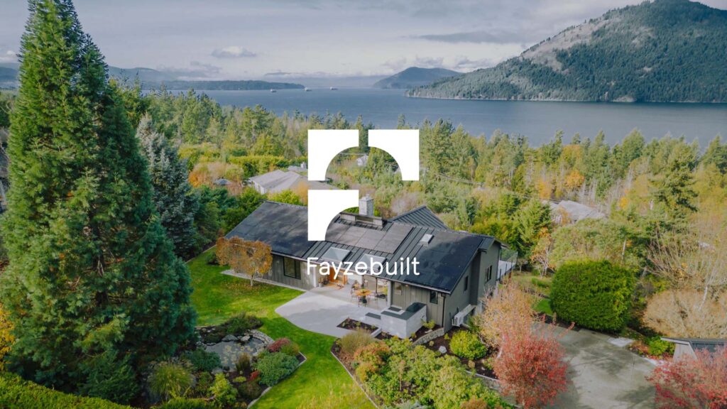 Photo of newly renovated house overlooking the ocean with modern logo